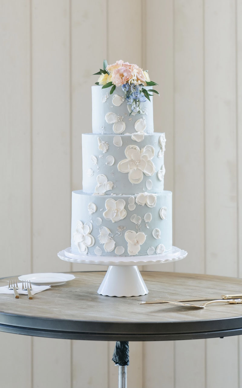 Light Blue Wedding Cake with White Fondant Flowers